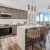 Well-lit kitchen with ample counter space